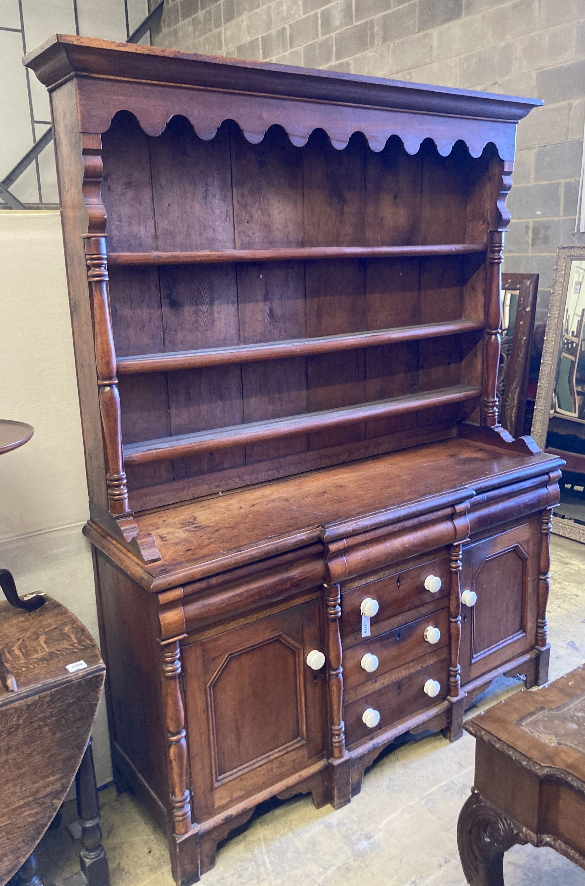 A Victorian North Country mahogany and pine breakfront dresser, width 165cm, depth 49cm, height 217cm